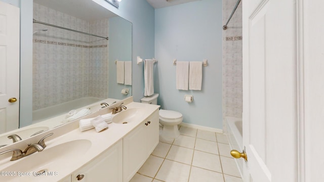 full bathroom featuring bathtub / shower combination, tile patterned flooring, and a sink