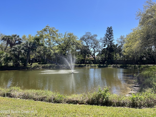 view of water feature with fence