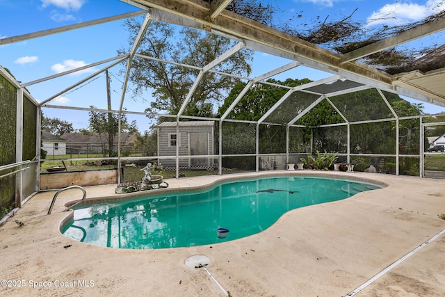 outdoor pool with a patio area