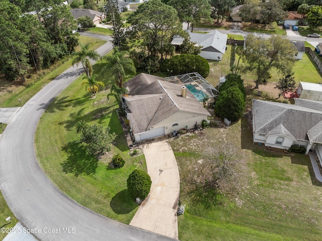 birds eye view of property with a residential view