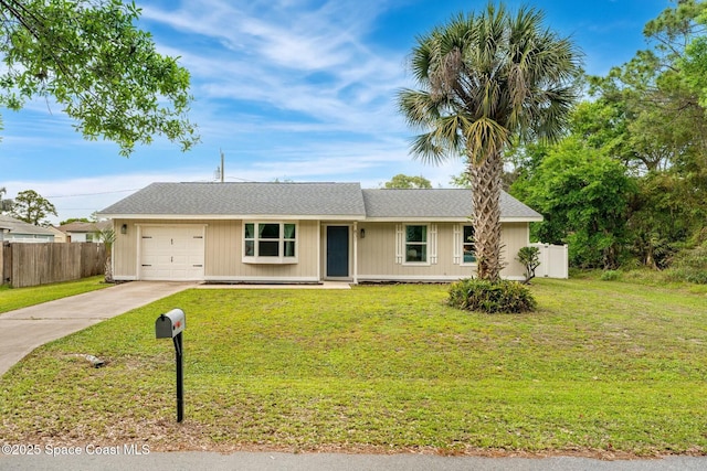 single story home with driveway, a garage, fence, and a front yard