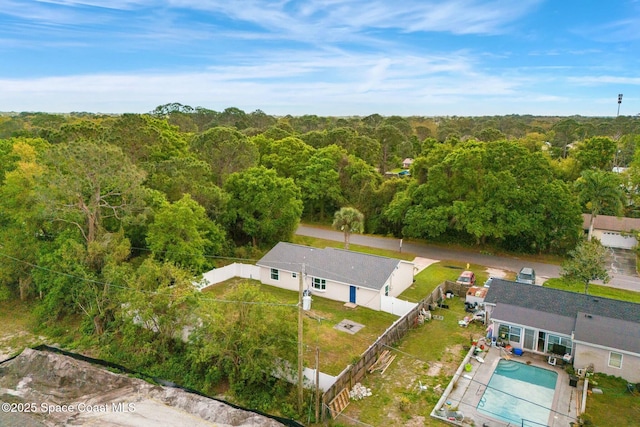 bird's eye view with a forest view