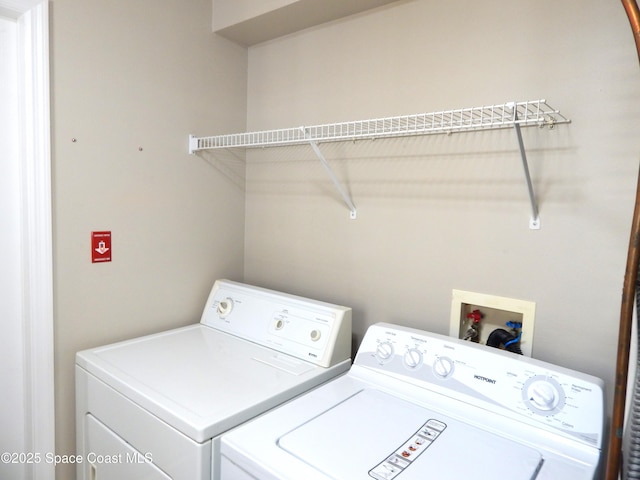4590 Brantford Ct, Rockledge, FL 32955 - clothes washing area featuring separate washer and dryer