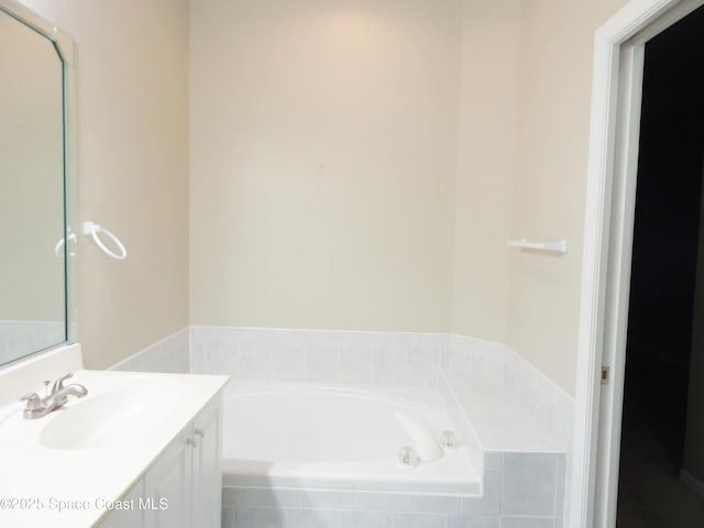 4590 Brantford Ct, Rockledge, FL 32955 - bathroom with vanity and a garden tub