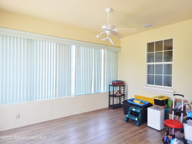 4590 Brantford Ct, Rockledge, FL 32955 - recreation room featuring wood finished floors and a ceiling fan