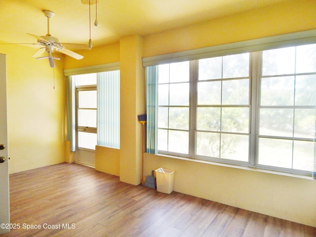 4590 Brantford Ct, Rockledge, FL 32955 - empty room with wood finished floors and ceiling fan