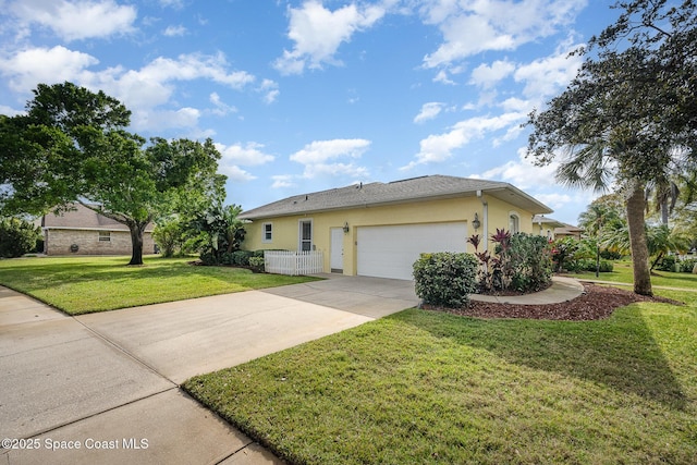 single story home featuring a garage, driveway, a front lawn, and stucco siding