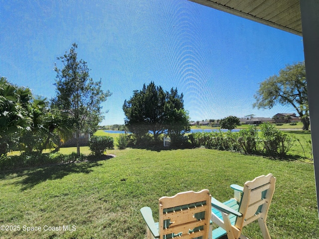 view of yard with a water view