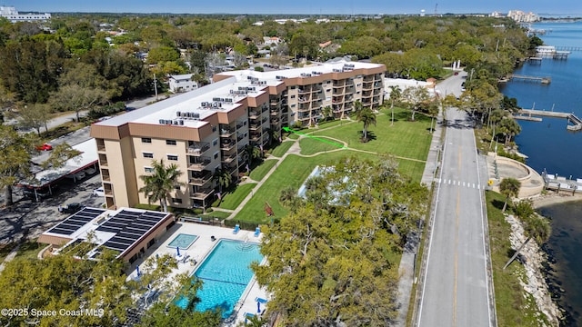 birds eye view of property with a water view