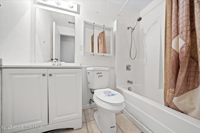 full bath with toilet, vanity, visible vents, tile patterned floors, and shower / bath combo