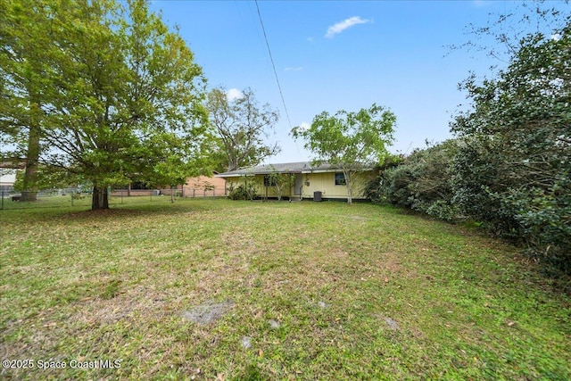 view of yard featuring fence