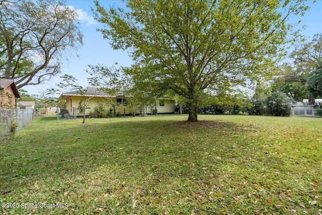 view of yard with fence