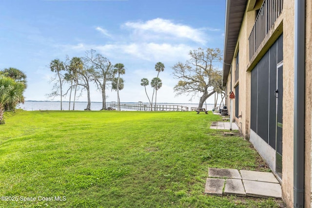 view of yard with a water view