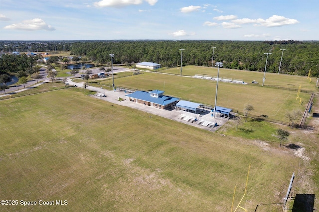 birds eye view of property with a rural view and a view of trees