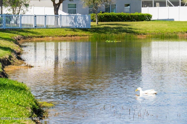 water view featuring fence