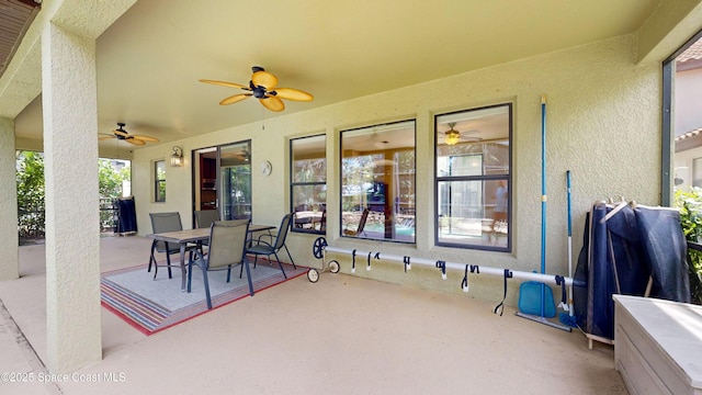 view of patio / terrace featuring a ceiling fan and outdoor dining area