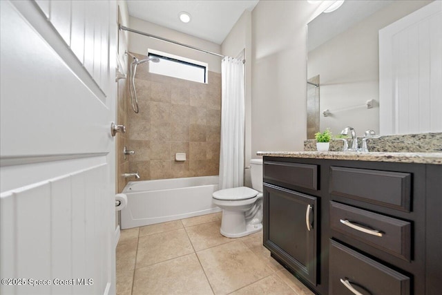 bathroom featuring shower / tub combo with curtain, vanity, toilet, and tile patterned floors