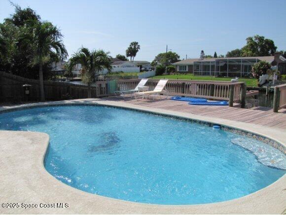 pool featuring fence