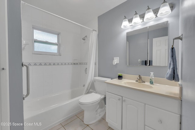 full bath featuring tile patterned floors, shower / bath combo with shower curtain, toilet, and vanity