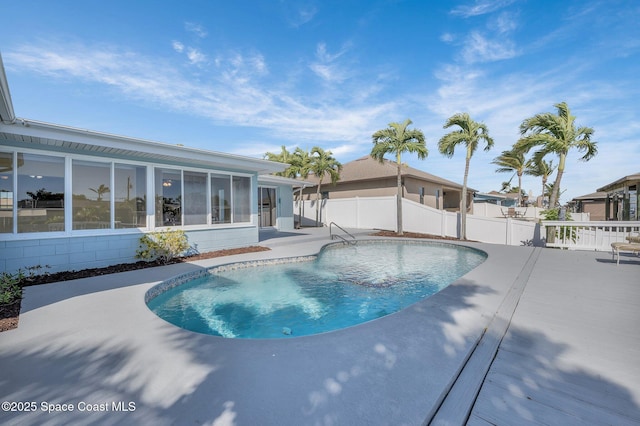 view of swimming pool with a fenced in pool, a patio, and a fenced backyard