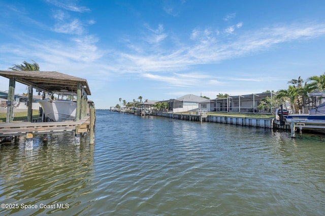 view of dock featuring a water view and boat lift