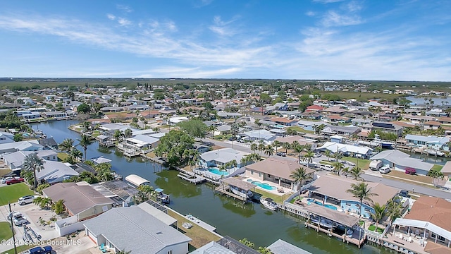 bird's eye view featuring a residential view and a water view