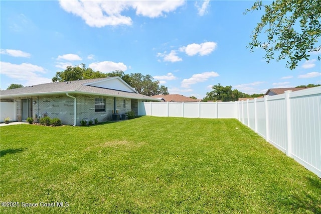 view of yard featuring a fenced backyard