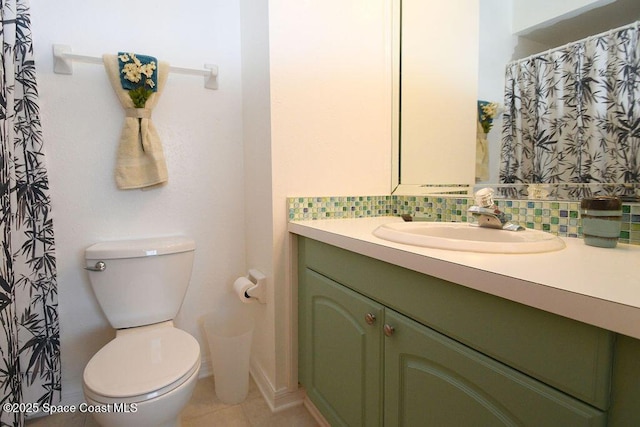 full bathroom with tasteful backsplash, tile patterned flooring, vanity, and toilet