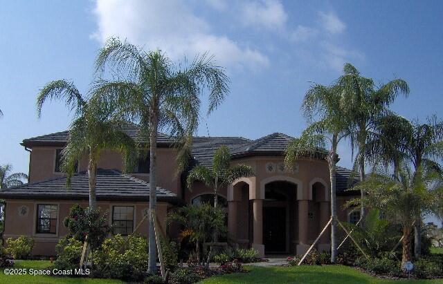 view of front of home featuring stucco siding