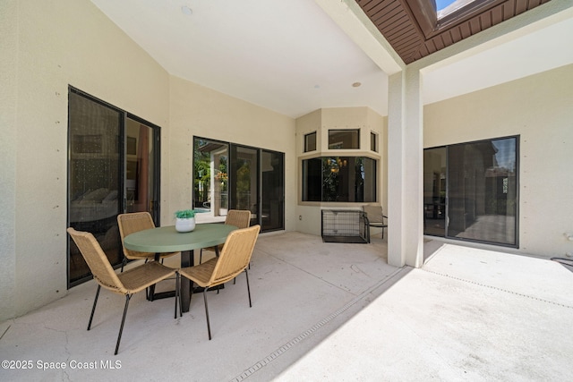 view of patio featuring outdoor dining space