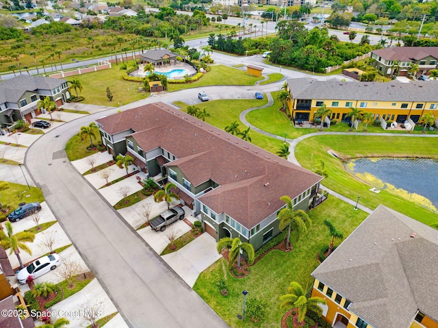 aerial view with a water view and a residential view