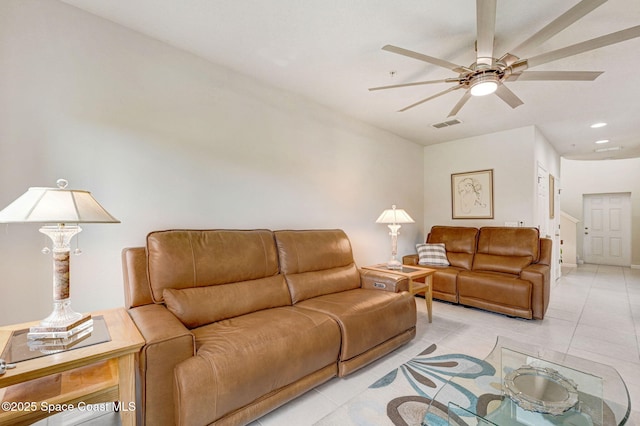 living area featuring light tile patterned floors, ceiling fan, visible vents, and recessed lighting