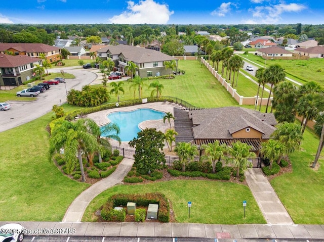 birds eye view of property with a residential view