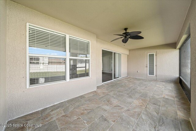 view of patio with ceiling fan