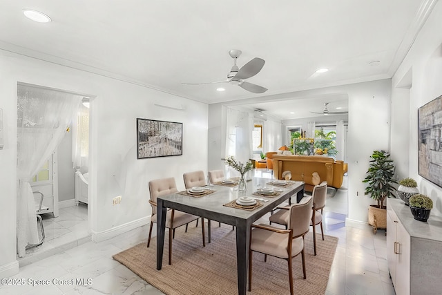 dining space with ceiling fan, recessed lighting, baseboards, marble finish floor, and ornamental molding