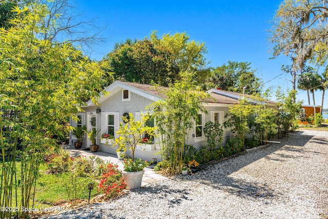 view of front of house featuring solar panels