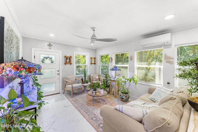 sunroom featuring ceiling fan and a wall mounted AC