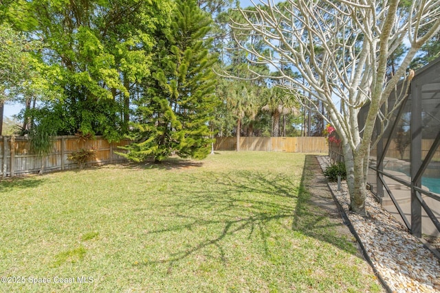 view of yard featuring a fenced backyard