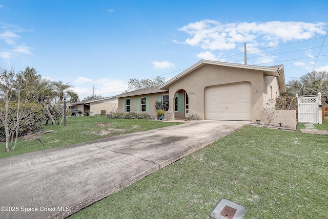 view of front of home featuring stucco siding, concrete driveway, an attached garage, a gate, and a front lawn