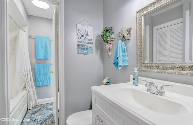 full bathroom featuring toilet, shower / bath combination with curtain, and vanity