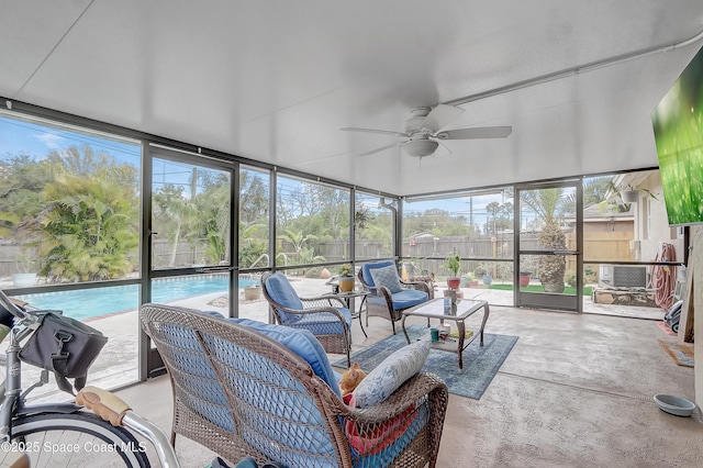 sunroom / solarium with ceiling fan