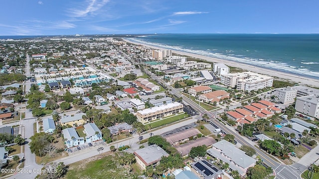 aerial view with a beach view and a water view