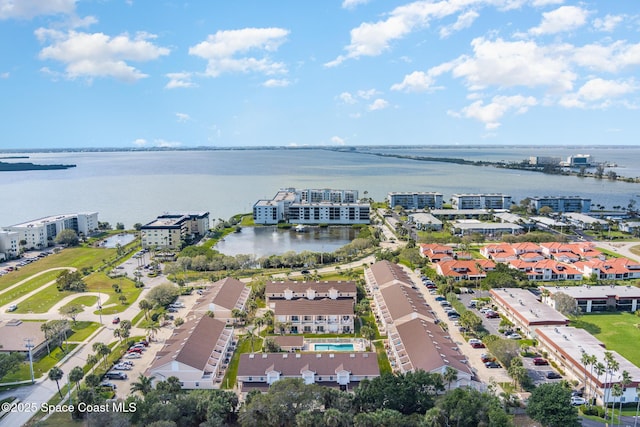 bird's eye view with a water view