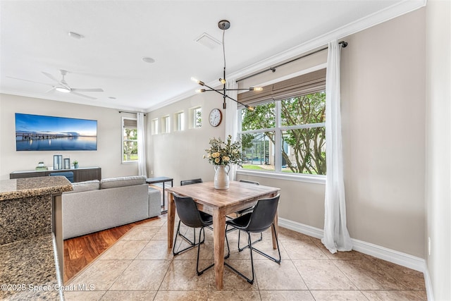 dining space featuring baseboards, light tile patterned floors, crown molding, visible vents, and ceiling fan with notable chandelier
