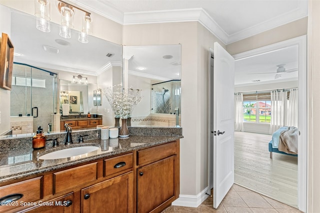 ensuite bathroom featuring crown molding, connected bathroom, tile patterned flooring, and a stall shower