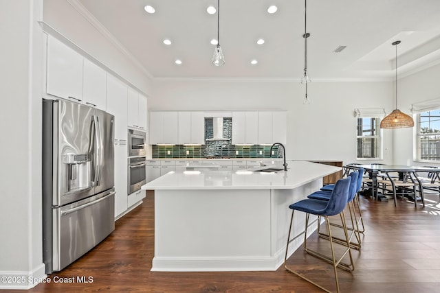 kitchen featuring a sink, visible vents, white cabinetry, appliances with stainless steel finishes, and modern cabinets