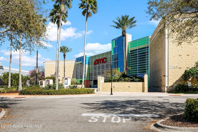 view of property with uncovered parking