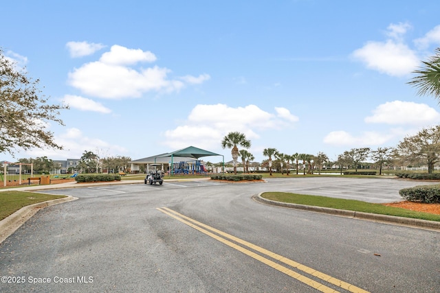 view of road featuring curbs