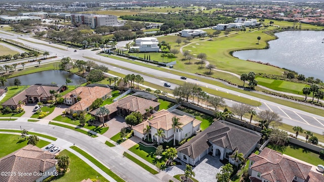 aerial view with a water view and a residential view