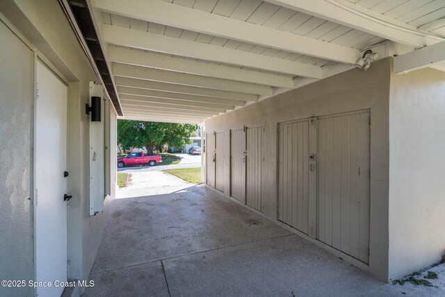 view of patio / terrace featuring an attached carport